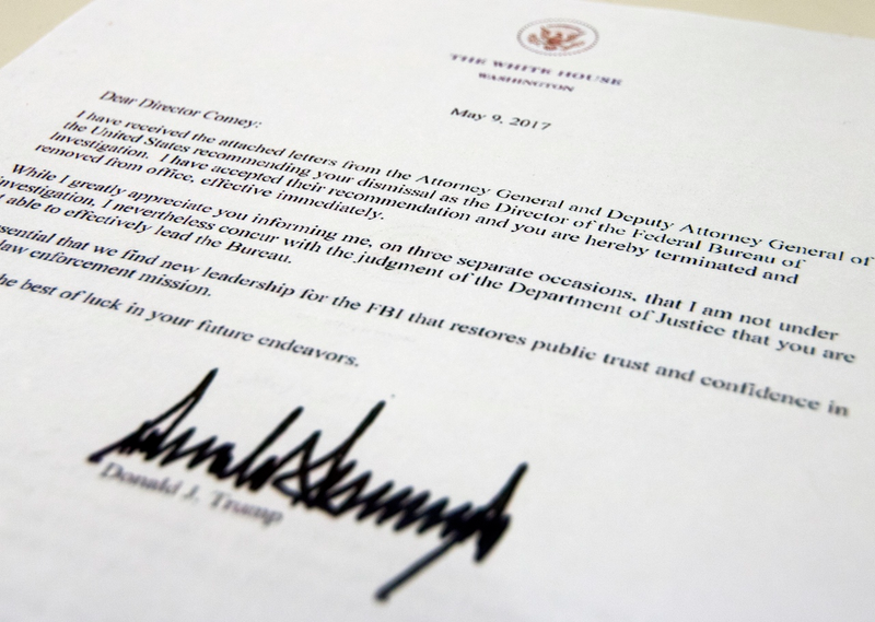 The termination letter from President Donald Trump to FBI Director James Comey is photographed in Washington, Tuesday, May 9, 2017. (AP Photo/Jon Elswick)